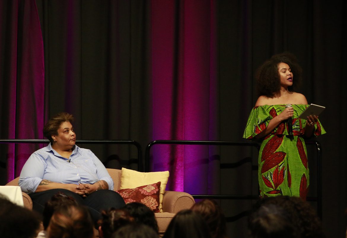 Roxane Gay (left) listens to actress and poet, Yazmin Monet Watkins (right) as she reads aloud a poem about her bi-sexual experience. 

Photo credit: Clare Calzada