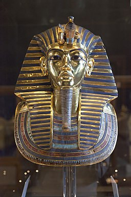 gold and blue Egyptian statue