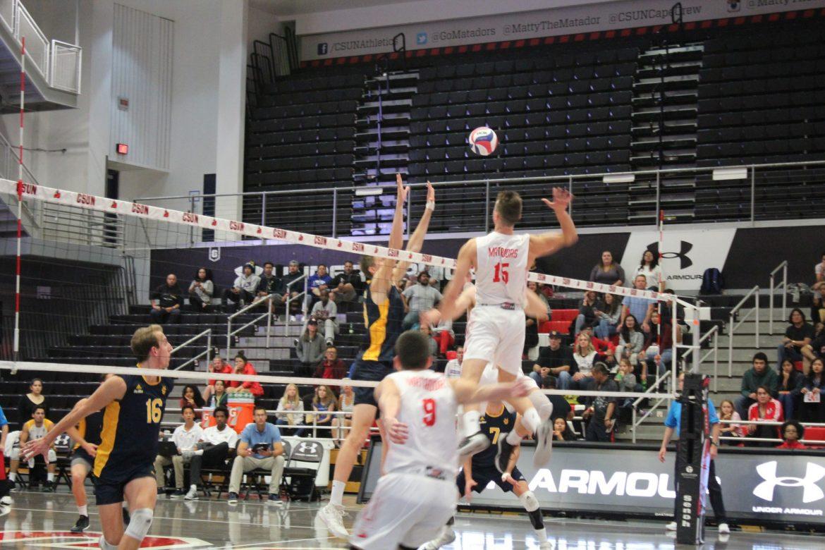 CSUN mens volleyball player goes to spike the ball