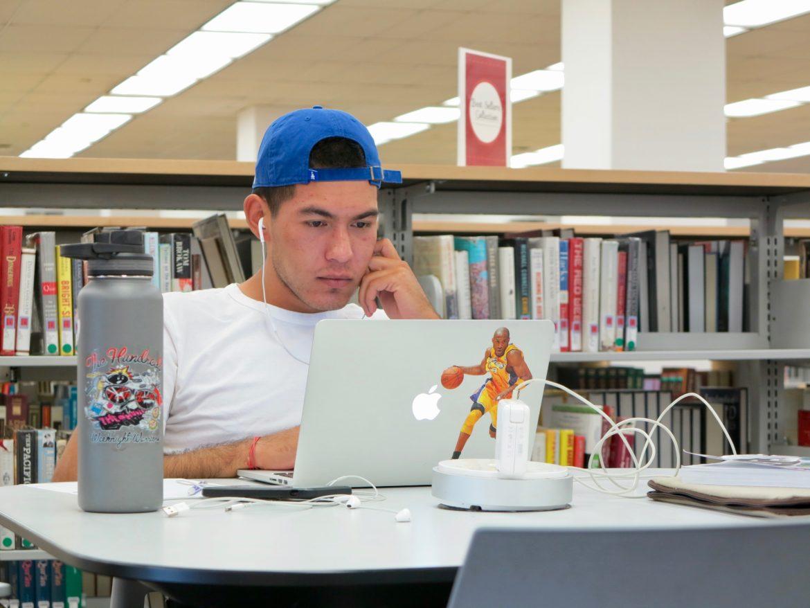 CSUN senior and business major, Rubin Lopez, utilizing space available in the Oviatt Library. Photo credit: Trevor Sena