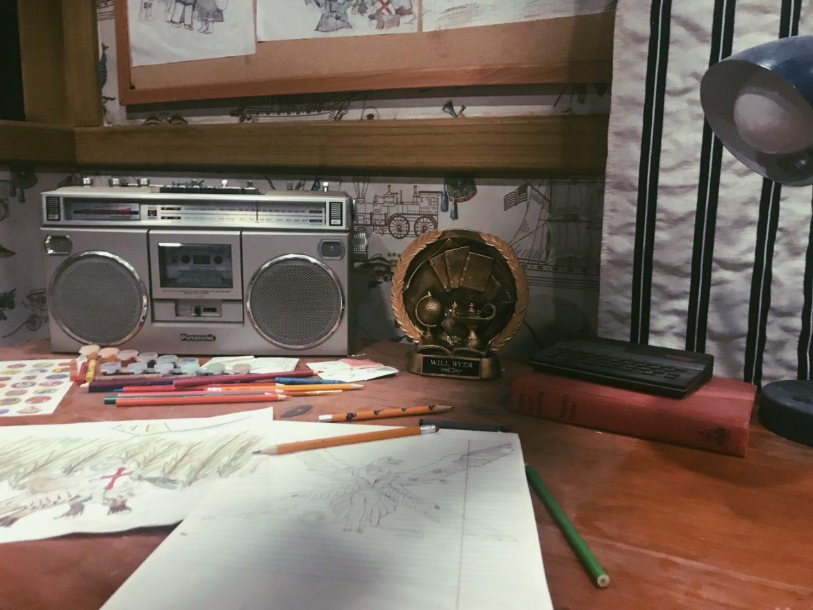desk with radio and trophy