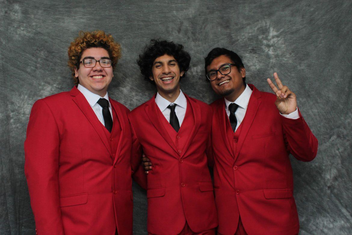 three guys in red jackets