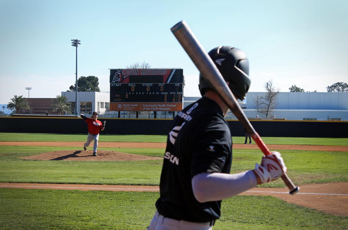 Sophomore Brandon Bohning watches as the pitcher warms up before he goes to bat in a scrimmage at the Matador Baseball Field on Feb. 8. Bohning is coming off a true freshman season in which he started 57 games, hitting .260 with 40 runs and 26 RBIs. Photo credit: Clare Calzada