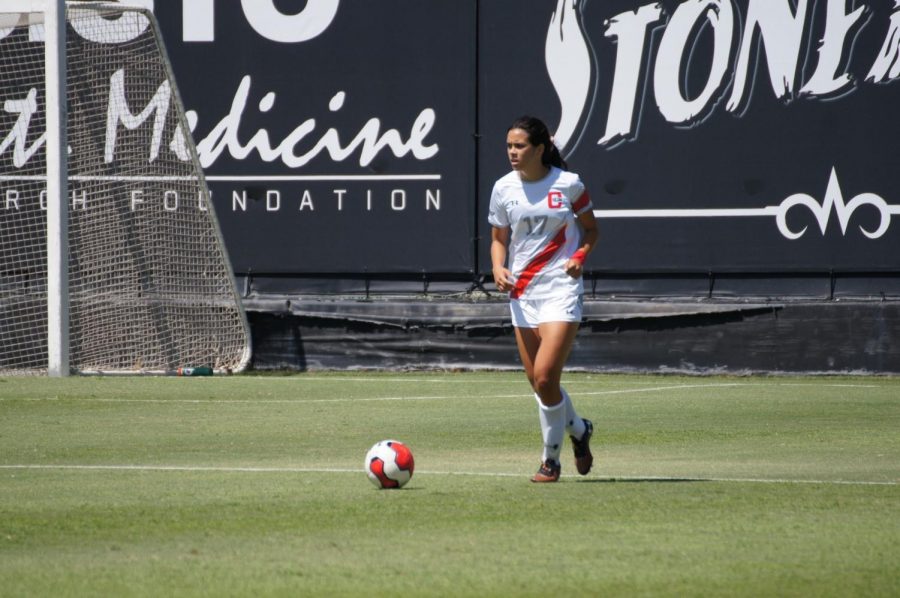 A CSUN Womens Soccer player at a ball possession