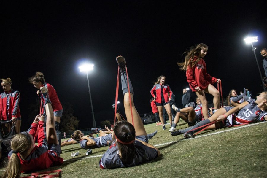 CSUN Womens soccer team stretches after the game