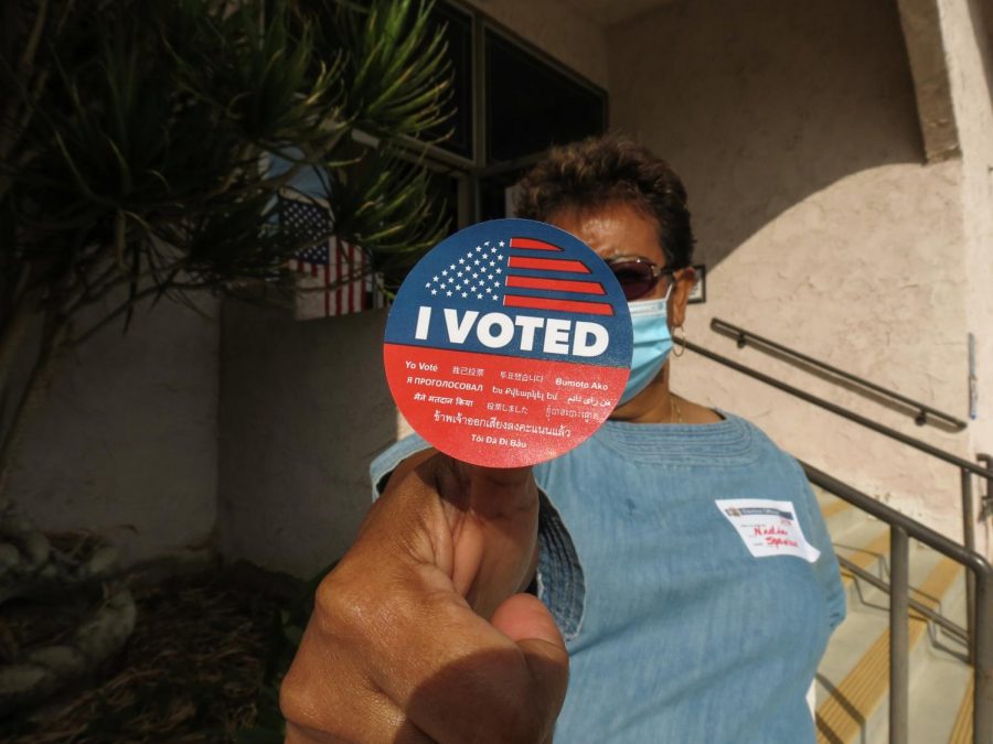 Nidia Matthews showing off her I Voted sticker in Canoga Park, Calif., on Election Day, Nov. 3rd, 2020.