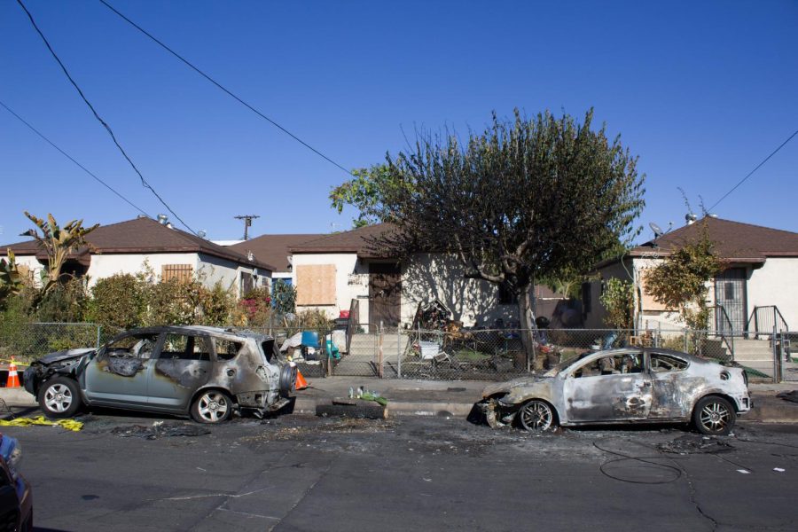 Two+scorched+cars+are+seen+in+front+of+residential+homes+after+a+single-engine+plane+crash+near+Whiteman+Airport+in+Pacoima%2C+Cali.%2C+on+Thursday%2C+Nov.+12%2C+2020.+Neighbors+pass+by+the+cars+days+after+the+accident+that+left+the+pilot+dead.