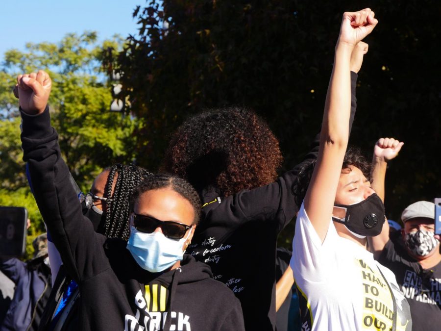 Young Black Lives Matter Los Angeles members chant at the center of a group circle that ends every protest.
