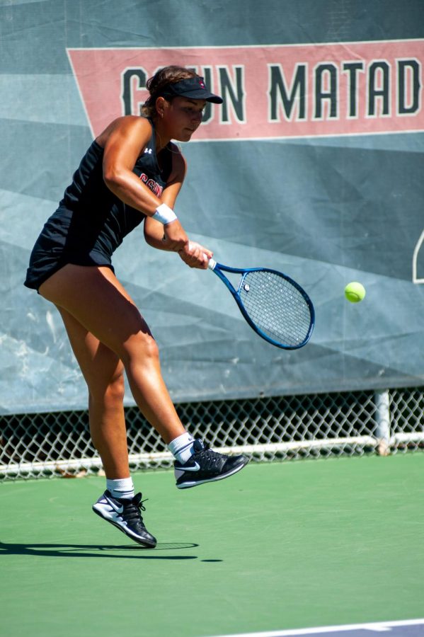 Sasha Turchak prepares to hit the ball during her singles match against the Santa Clara Broncos Giulia Hayer at the Matador Tennis Complex in Northridge, Calif., on Wednesday, March 27, 2021.