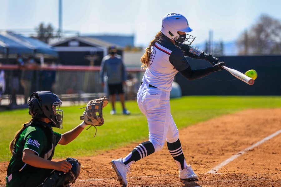 Sami Garcia gets a hit during a game against the Hawaii Rainbow Wahine at the Matador Diamond Softball Field in Northridge, Calif. on Friday, March 26, 2021. The Matadors lost the first game of the series 5-1.