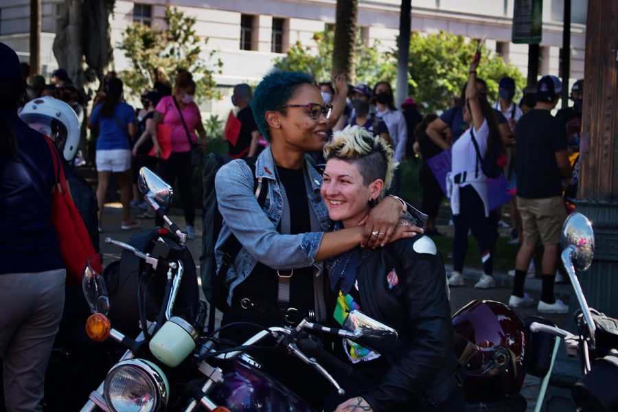 A fleet of motorcyclists, including members of the “East Side Moto Babes”, gathered and revved their engines at the steps of City Hall during a rally for abortion justice in downtown Los Angeles, Calif., Oct. 2, 2021.