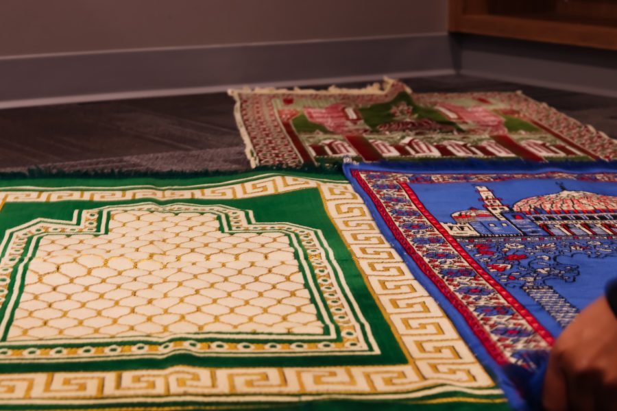 MSA President Redhawam Ahmed lays out three Musallah (prayer rugs) in the East Conference Centers prayer room at CSUN in Northridge, Calif. on Friday, Oct. 8, 2021.