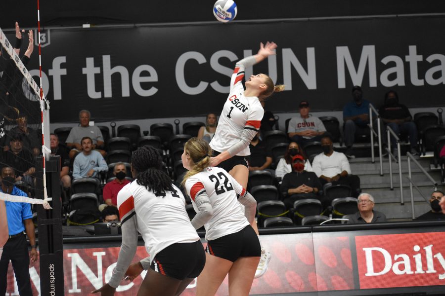 Taylor Orshoff, 1, going up for the kill attempt against the Cal Poly Mustangs in the Matadome in Northridge, Calif., on Friday, Nov. 5, 2021.