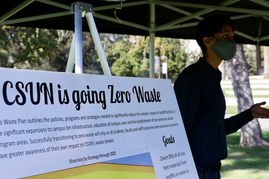 Nikhil Schneider, the energy and sustainability coordinator, informs students on how CSUN is going zero waste at the America Recycles Day: Race to Zero Waste event on the Sierra Lawn in Northridge, Calif., on Nov. 16, 2021.