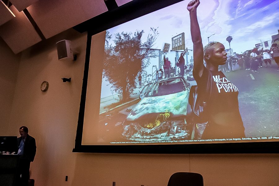 Ringo Chiu presents his Pulitzer Prize-winning photograph in front of CSUN students and staff members in Kurland Lecture Hall in Northridge, Calif., on Wednesday, Feb. 16, 2022.