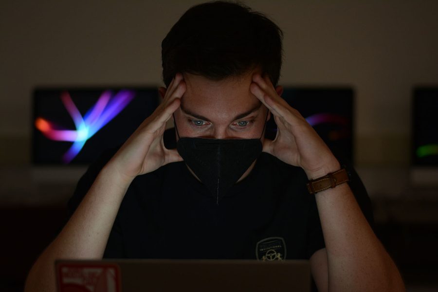A person facing a computer