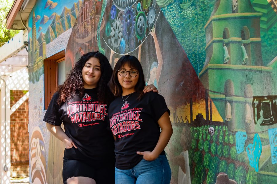 Portrait of Jessica Flores Rodriguez and Yoselin Deleon in front of the mural on the Casita behind the Chicana Studies building at CSUN taken on Mar. 18, 2022, in Northridge, Calif. I myself am a child of immigrants and there has always been that tear between community ... for me more importantly it has kind of being able to get in touch with that part of myself that I would not have been able to learn about if it wasnt for the Central American Studies department, the discussion of trauma is very focused, Deleon said. A big thing with us is breaking that generational trauma and being able to discuss these things and critic and observe why our life is the way that it is.