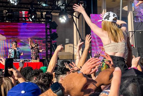 A fan sits on the shoulders of the crowd as Can2 B2B and Lo$t Visuals perform at Big Show at CSUN on March 12, 2022.