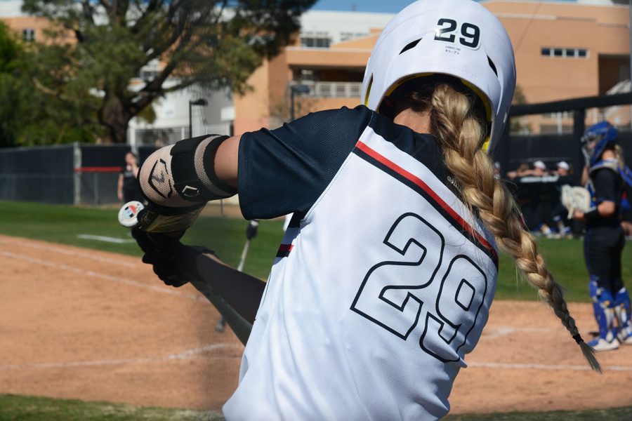CSUN freshman and softball first baseman Mikayla Carman practices her swing before stepping up to bat at Matador Field on March 16, 2022, in Northridge, Calif.