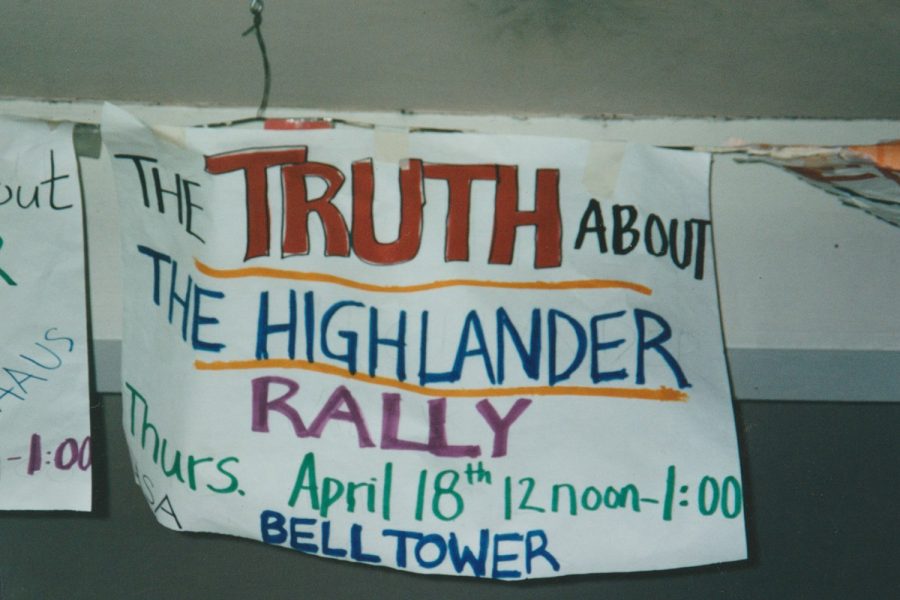 A sign written The truth about the highlander rally...