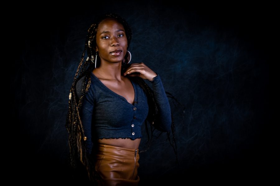 Portrait of Kaila Moore-Jones taken in the CSUN campus photo studio.