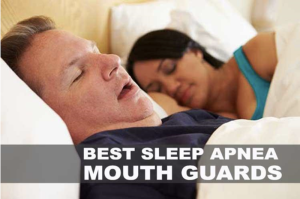 man snoring in bed while woman sleeps next to him