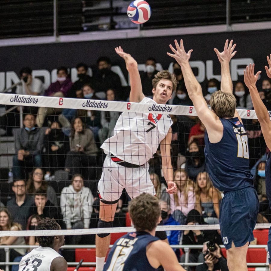 Kyle Hobus goes for the spike during the game against UC Santa Barbara.