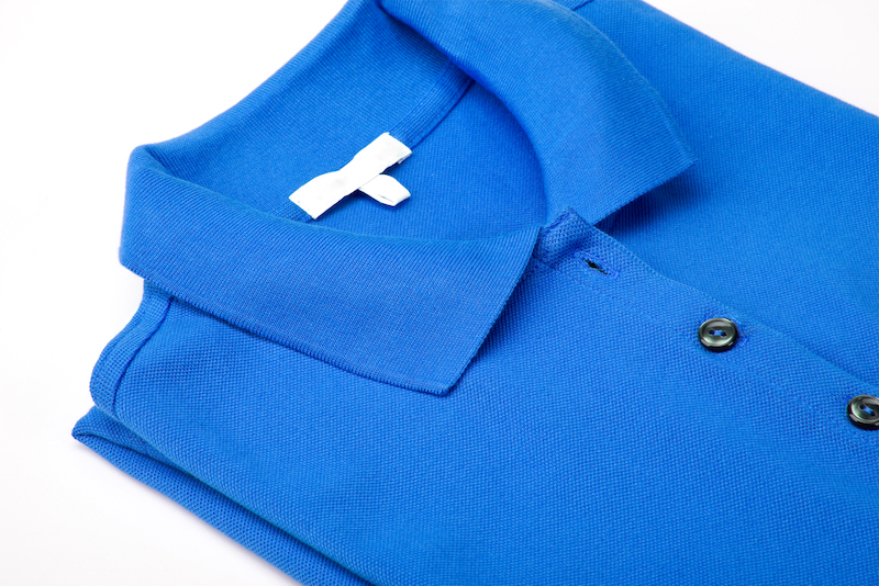 folded+blue+polo+shirt