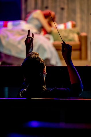 The lead conductor performs at a tech rehearsal for “Into the Woods” at the CSUN Campus Theatre on April 6, 2022, in Northridge, Calif.