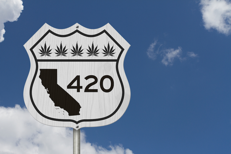 420 California message with cannabis leaves on a sign