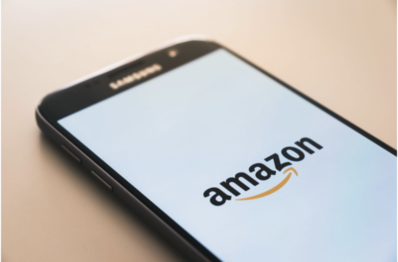 cellphone displaying Amazon logo