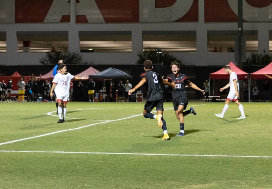 Defender Dylan Gonzalez, 3, and forward David Diaz, 58, celebrate the formers go-ahead goal in the 73rd minute against the Saint Marys College Gaels on Sept. 21, 2022, at the Performance Soccer Field in Northridge, Calif.