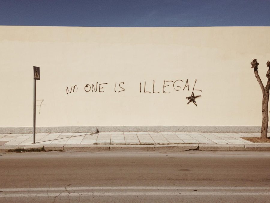 a wall written No one is illegal