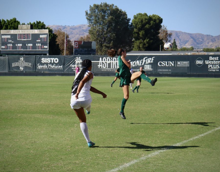 CSUN womens soccer player kicking the ball
