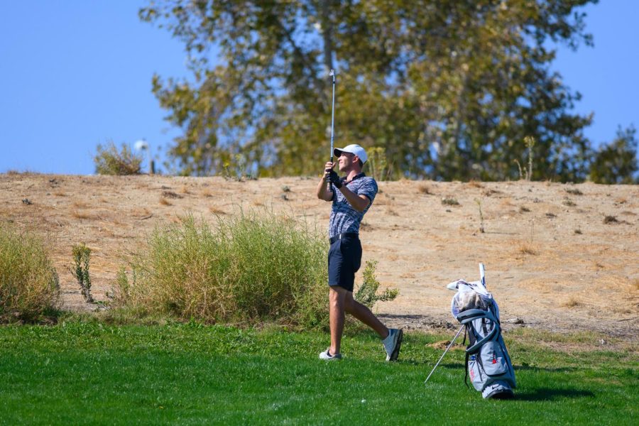 CSUN mens golf athlete swing the golf cue