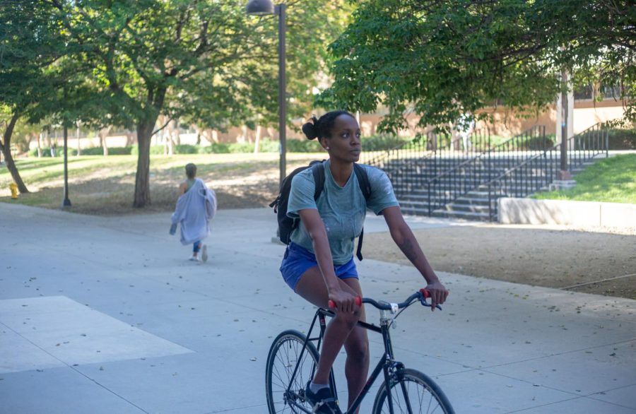 CSUN student Danielle Lee rides her bike on campus on Sept. 30, 2022, in Northridge, Calif.