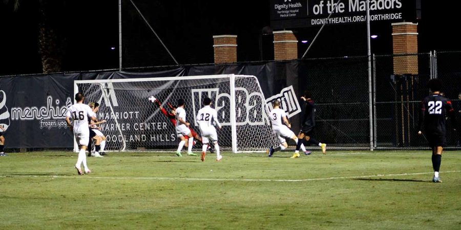 Matadors defender Dylan Gonzalez takes a shot on goal in the second half of the game against UC Irvine on Saturday, Oct. 22, 2022, at the Performance Soccer Field in Northridge, Calif.