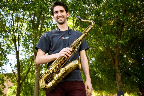 Kosta Kutay holds his saxophone at CSUN on Oct. 6, 2022, in Northridge, Calif.