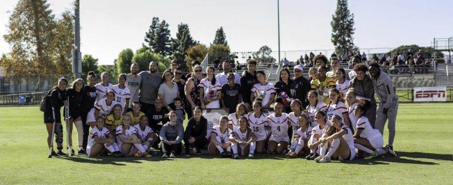Three Matador seniors, Gabriela Robles, Cindy Arteaga and Taylor Thames, take photos with family, friends and the team on Senior Day on Sunday, Oct. 23, 2022, at the Performance Soccer Field in Northridge, Calif.