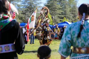 A person dancing at the native American celebration