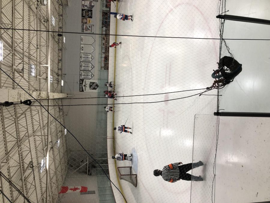Hockey team playing against another team