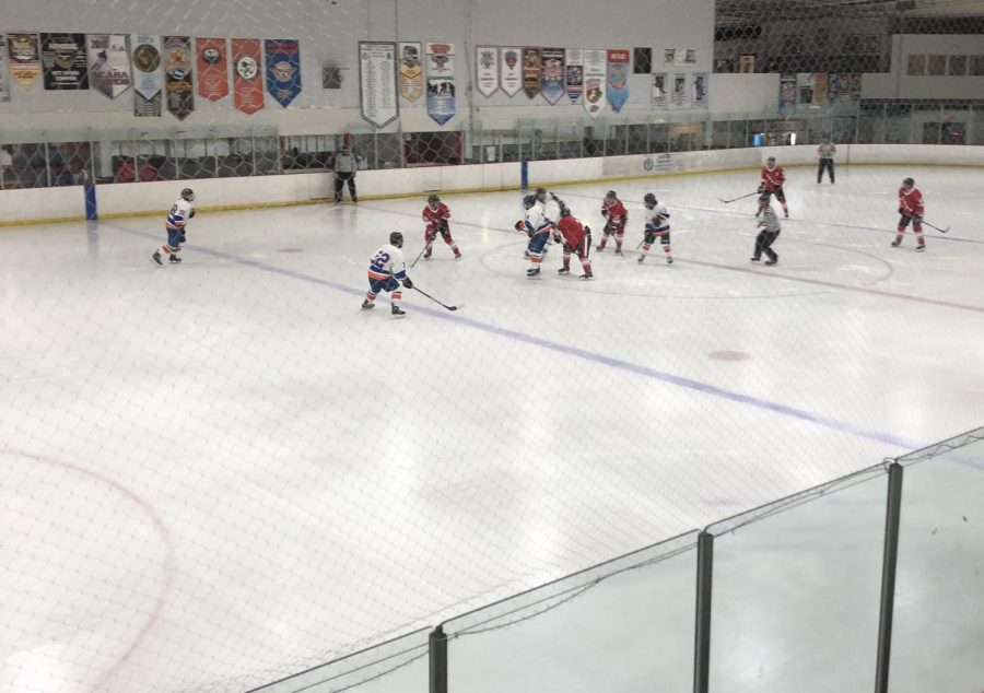 Hockey team playing against another team