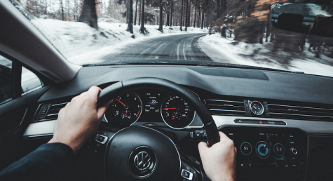 interior of a car driving on a snowy road