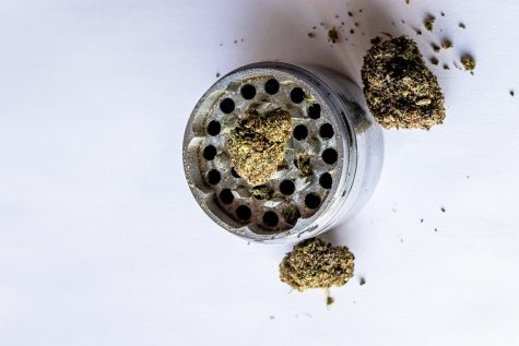 A picture of a grinder and weed
