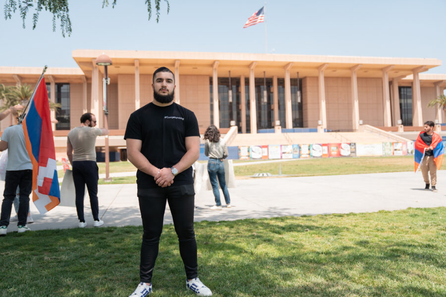 CSUN+Armenian+Students+Association+President+Varuzhan+Bilbulyan+stands+in+front+of+the+CSUN+University+Library+during+the+Stain+of+Denial+protest+on+April+25%2C+2023%2C+in+Northridge%2C+Calif.