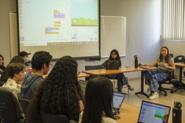 The Girls Who Code club met together in Sierra Hall, on Friday, Sept. 15, in Northridge, Calif. Club members played around with a program to create a virtual game.