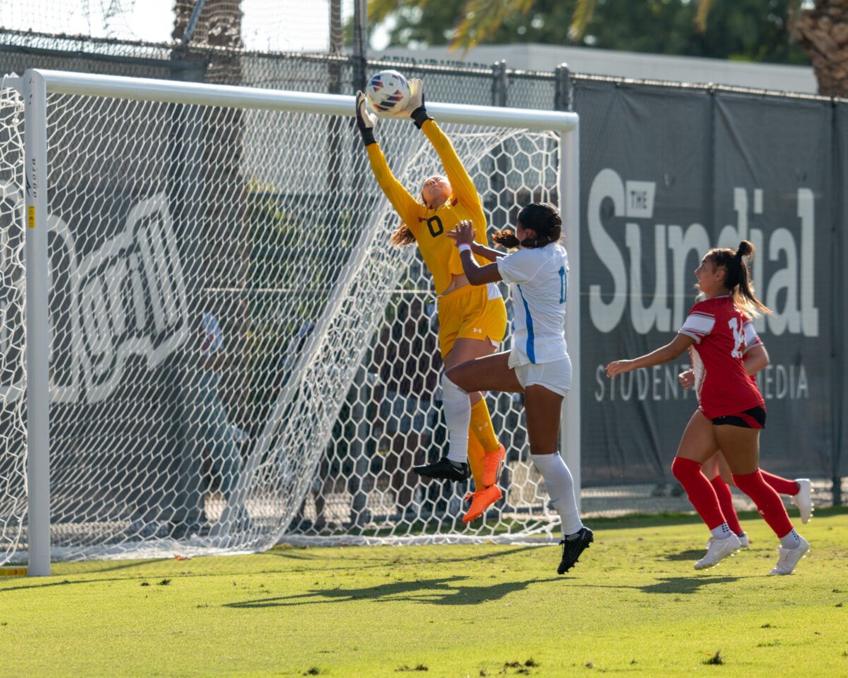 CSUN goalkeeper Hayden Mauldin goes up for one of several saves against UCLAs shots on goal during the first half of their game in Northridge, Calif., on Sept. 10, 2023.