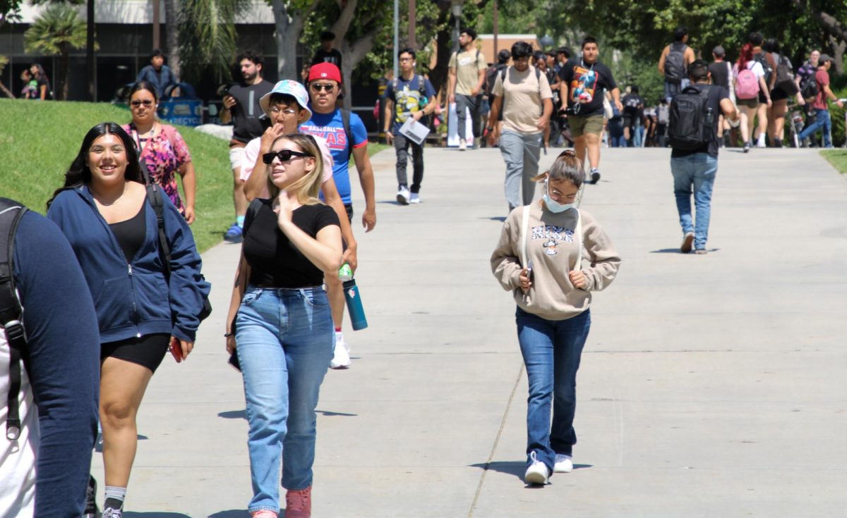 Students walking past the University Library on Thursday, Aug. 31, 2023 in Northridge, Calif.
