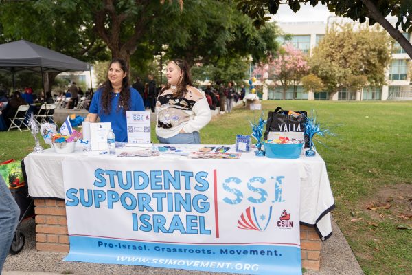 CSUN SSI President Sharon Shashoua and student Shira Goldstein at the organizations supply drive for Israel at Cleary Walk on Oct. 25.