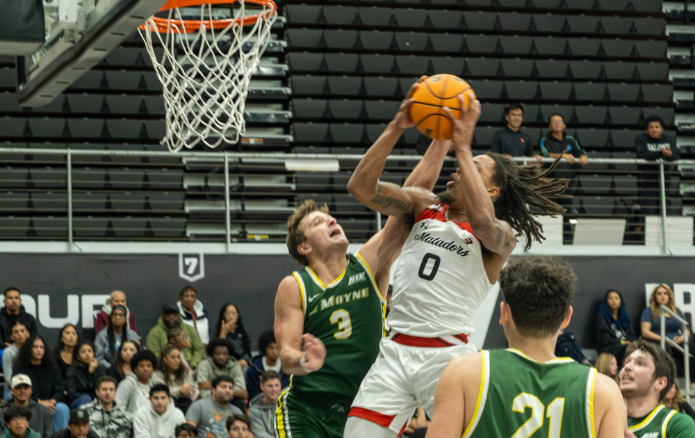 CSUN Matador guard Dionte Bostick goes for a lay-up at the CSUN vs Le Moyne university game on Nov. 21 in Northridge, Calif.